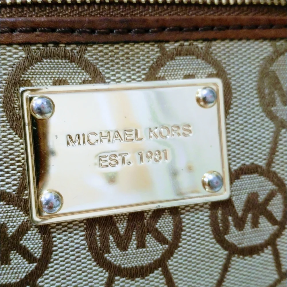 Michael Kors Monogram Wristlet.